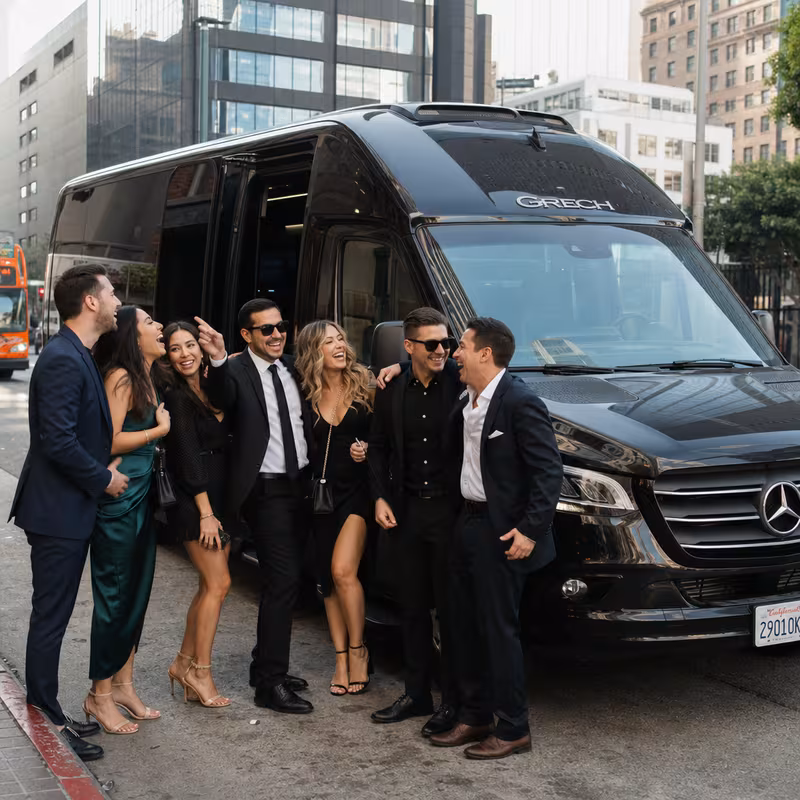 Group boarding a white charter bus for Bachelor & Bachelorette Transportation transportation in Los Angeles