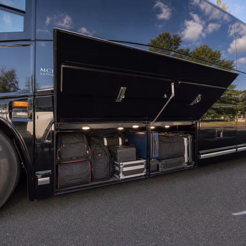 Party bus interior with wraparound leather seating and LED lighting in Los Angeles